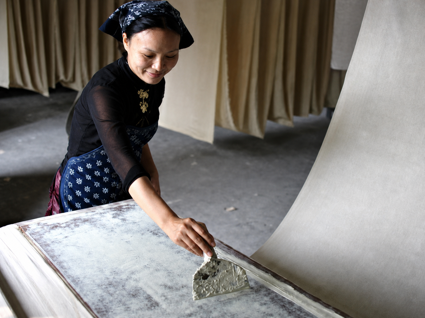 Shengzhu applying soy resist paste